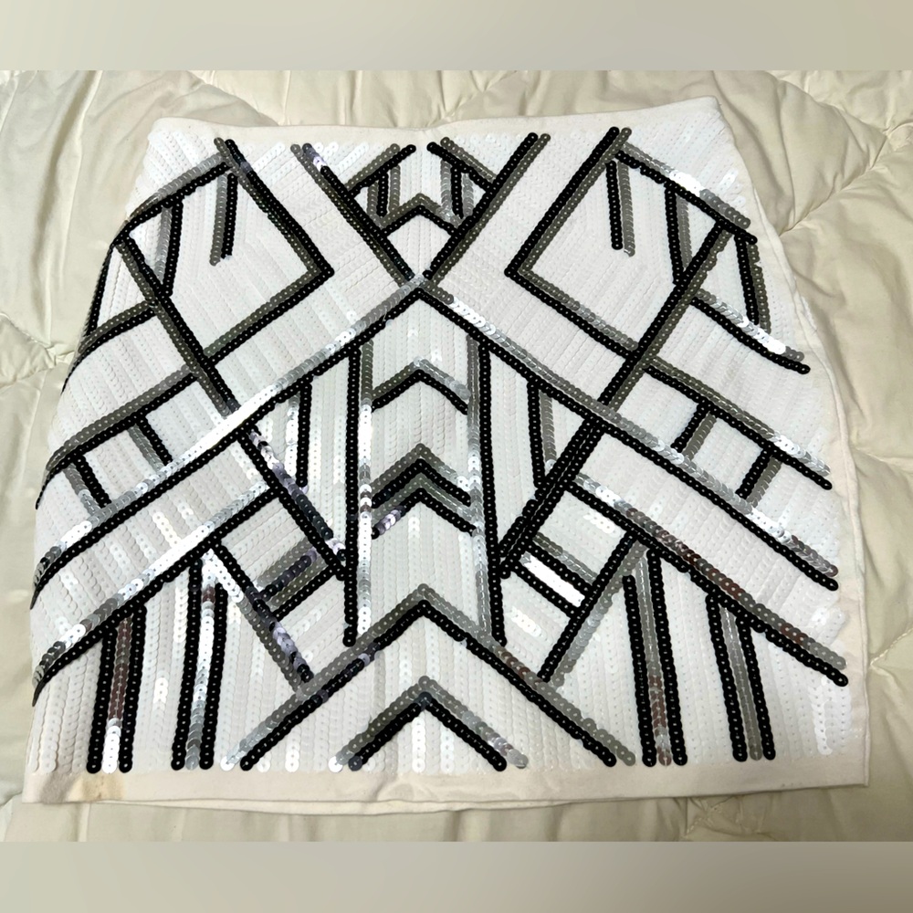 Brand new. Never worn white black & silver sequins skirt from Express.